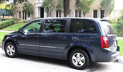 A three-quarter rear view of a 2008 Grand Caravan SXT
